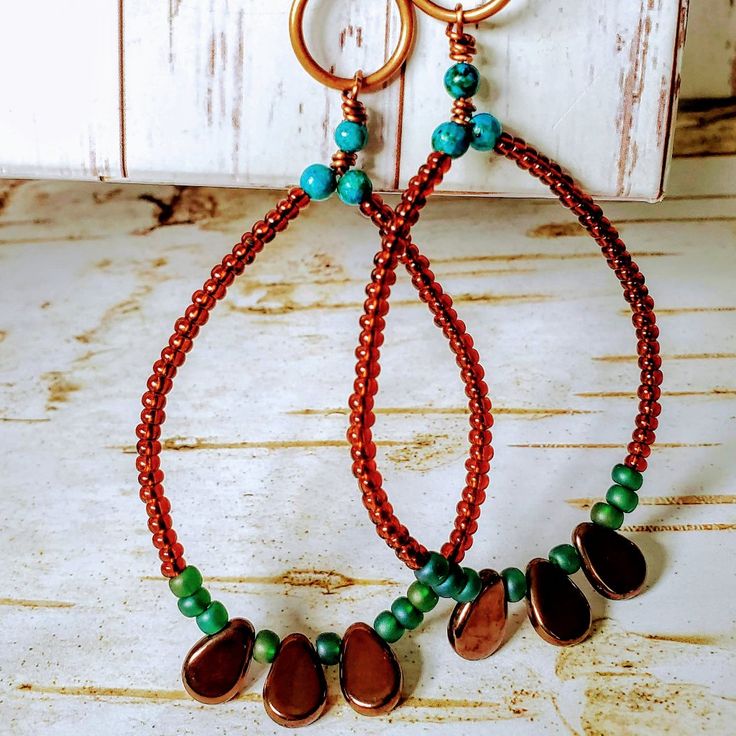 Long And Dangling, Artist Designed Beaded Southwest Boho Earrings. Crafted With Beautiful Glazed Metallic Bronze Czech Glass Tear Drop Beads, Aqua-Turquoise Azurite Stones, Tortoiseshell Miuki Seed Beads, Japanese Green Iridescent Glazed Beads And Copper Accents. Length: 5 Inches Brown Teardrop Beaded Earrings With Colorful Beads, Brown Teardrop Beaded Earrings, Colorful Beaded Brown Earrings For Beach, Beach Beaded Earrings With Colorful Beads, Brown Round Beads Earrings For Beach, Brown Beaded Earrings For The Beach, Brown Beaded Earrings For Beach, Brown Round Beaded Earrings For Beach, Brown Round Bead Earrings For The Beach