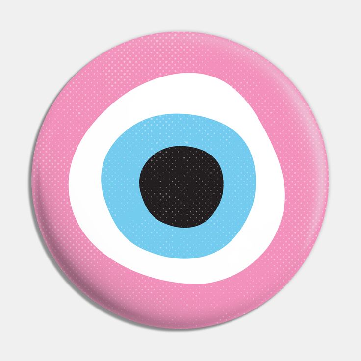 a pink and blue button with an eyeball on it