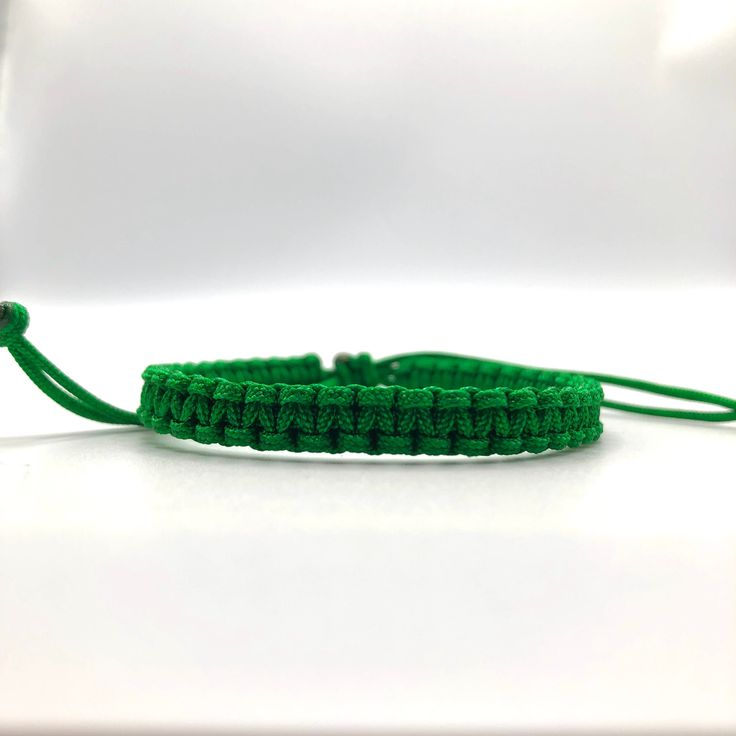 This bracelet is make with Chinese Knotting Cord about 1.5mm thin cord. The Bracelet is adjustable in size, 6 inches closed to 12 1/2 inches. Color: Green Feel free to contact me for any question!! *Color may slightly different due to the lighting!! ** This is HANDMADE item, the color of pattern, shape might be little different Green String Bracelet, Chinese Knotting Cord, Chinese Knotting, Braid Bracelet, Surfer Bracelets, Lucky Bracelet, Bracelet Simple, Chinese Knot, Yoga Bracelet