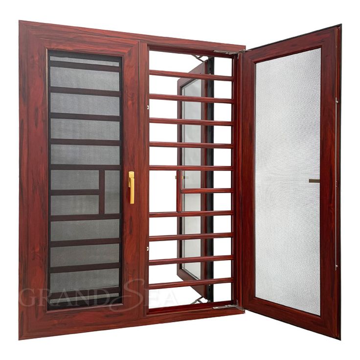 an open wooden door with glass panels