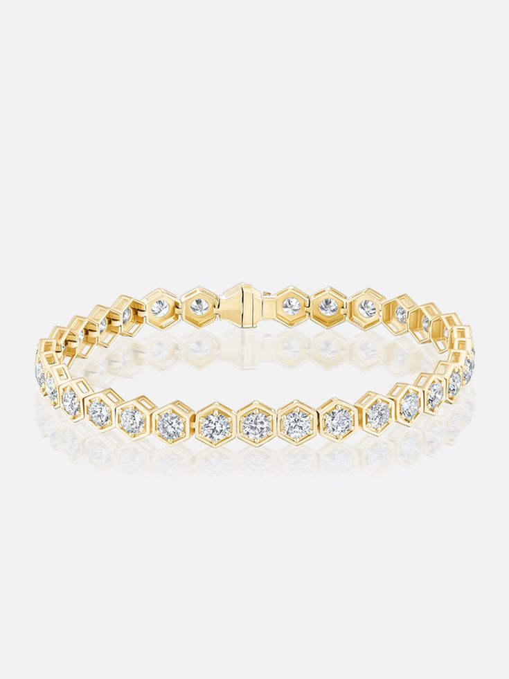 7" length. 18k yellow gold and 3.9mm round diamond tennis bracelet. Our signature tennis bracelet – one stunning row of hexagon bezel-set stones – is set with dazzling diamonds. Inquire for accurate pricing and diamond quality options. Made to order. The current lead time is 8-10 weeks. Tennis Bracelets Diamonds, Diamond Tennis Bracelet, Crystal Beads Bracelet, Tennis Bracelet Diamond, Women Diamond, Statement Bracelet, Diamond Jewellery, Jewelry Inspo, Beads Bracelet