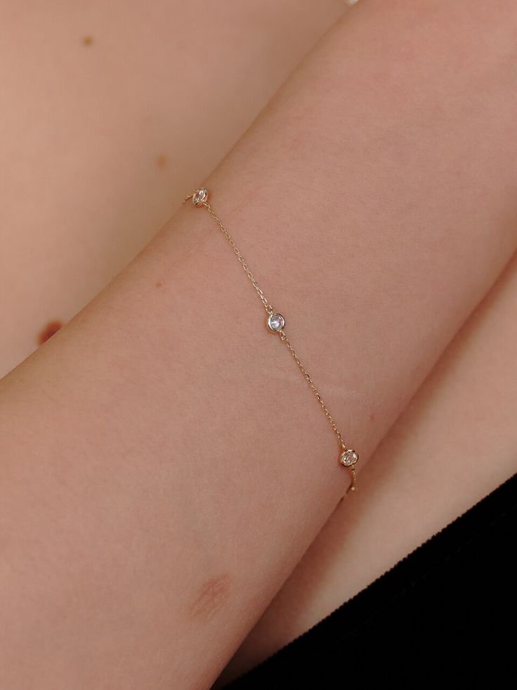 Editor's NotesDelicate and Sophisticated fine jewelry from BARA DU will add a charm to your outfit.- Cubic Zirconia setting Bracelet- Cable gold chain- Luxurious and elegant style- High polished textureMeasurement (in.)Cubic:  0.15âLength:- 5.9â - 6.3â- 6.3â - 6.7â- 6.7â-7.1â- 7.1â- 7.5âComposition & Care- 14K Gold Plated  CZ- Elegant Gold Chain Bracelet With Bezel Setting, Elegant Diamond Chain Bracelet With Delicate Chain, Formal Diamond Bracelet With Delicate Chain, Elegant 14k Gold Chain Bracelet With Bezel Setting, Elegant Bracelets With Delicate Cubic Zirconia Chain, Elegant Bracelet With Delicate Cubic Zirconia Chain, Elegant Cubic Zirconia Bracelet With Delicate Chain, Elegant Diamond Bracelet With Delicate Chain, Elegant Gold Bracelet With Bezel Setting For Everyday