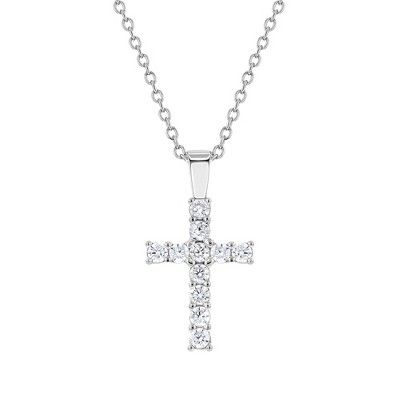 This dazzling cute sterling silver cross necklace for girls is made of 925 sterling silver and has multiple sparkling round cubic zirconias. Makes for an evocative gift on a loved ones special day whether it be their First Holy Baptism, Christening, First Holy Communion, First Reconciliation or Confirmation. A matching 16" chain is included. Packed carefully in a beautiful gift box. Cubic Zirconia Cross Necklace For Gift, White Gold Cubic Zirconia Cross Necklace For Anniversary, Classic Diamond White Cross Necklace For Gifts, Anniversary White Gold Cubic Zirconia Cross Necklace, Brilliant Cut Cubic Zirconia Cross Necklace As Gift, Gift Cross Necklace With Diamond Accents In Cubic Zirconia, Gift Diamond White Sterling Silver Cross Necklace, Classic Cubic Zirconia Cross Necklace For Gift, Classic Cubic Zirconia Cross Necklace As Gift