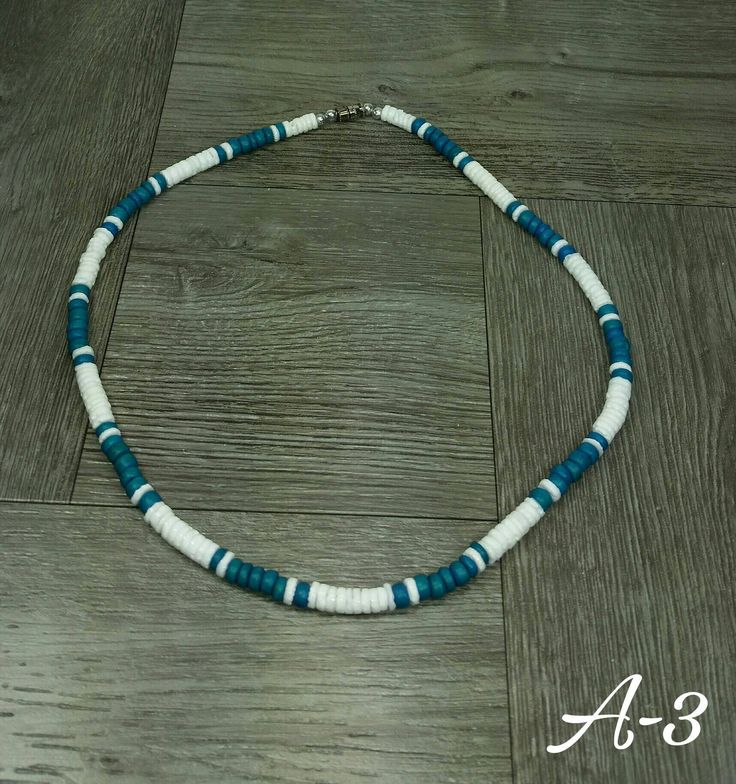 "Turquoise Puka Shell Necklace This Necklace is Unisex Is Handmade with seashells Fits Most Size - 17.5\" inches long FAST SHIPPING! Visit my Etsy Shop to see more Designs! Handmade Puka Necklaces, Bracelets and Earrings: https://www.etsy.com/shop/FreedomLifeStyle" Turquoise Strand Jewelry With Ocean-inspired Style, Blue Strand Necklace With Ocean-inspired Style, Turquoise Strand Jewelry In Ocean-inspired Style, Turquoise Strand Jewelry Ocean-inspired, Ocean-inspired Turquoise Strand Jewelry, Blue Ocean-inspired Strand Necklace, Handmade Blue Necklaces For Beach, Turquoise Ocean-inspired Necklaces For Jewelry Making, Handmade Blue Necklaces For The Beach