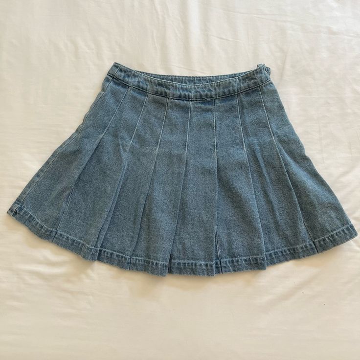 Denim Pleated High Waist Mini Tennis Skirt. Never Worn. Casual Medium Wash Pleated Denim Skirt, Pleated Medium Wash Denim Bottoms, Casual Denim Blue Pleated Mini Skirt, Denim Blue Pleated Denim Skirt, Blue Mid-rise Cotton Skort, Pleated Blue Denim Cotton Skirt, Blue Pleated Cotton Denim Skirt, Casual Blue Denim Skirt, Blue Cotton Pleated Denim Skirt