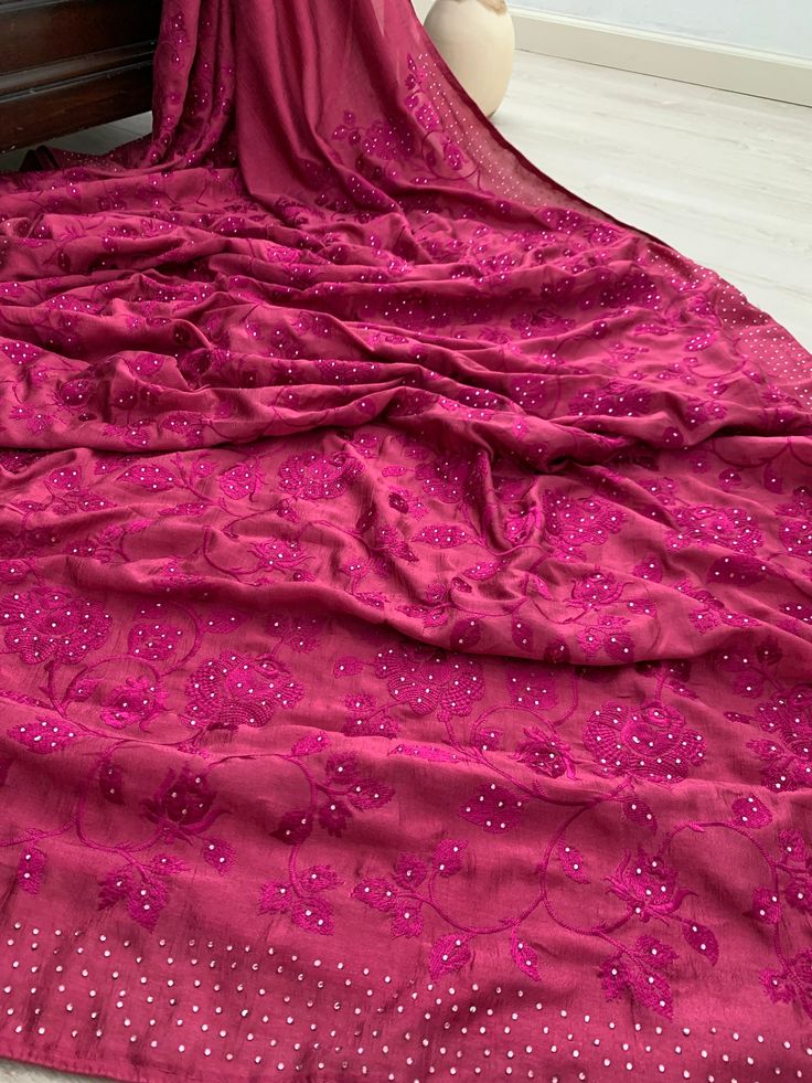 This Beautiful Magenta Crepe Georgette  Silk Saree is with beautiful embroidered  Border And Pallu !!  Light weight, Easy to Drape and Fall Well!! Comes with an unstitched matching blouse piece. Material: Semi Crepe Georgette  Silk (Very Good Quality, Feels like Pure) Fall & Pico ✅  ** Jewellery is not included! Disclaimer: slightly color variations may be possible due to light effects! Festive Pre-draped Saree With Dabka Work For Diwali, Pink Pre-draped Saree With Zari Work For Celebration, Chinon Pre-draped Saree With Dabka Work, Semi-stitched Georgette Saree For Celebration, Semi-stitched Dabka Work Saree For Celebration, Festival Celebration Saree With Dabka Work, Anarkali Style Georgette Pre-draped Saree For Celebration, Festive Celebration Saree With Dabka Work, Anarkali Style Pre-draped Georgette Saree For Celebration