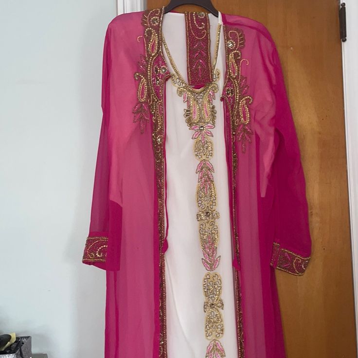 Never Worn Long Sleeve Caftan Dress. Comes With White Under Piece So It Will Not Be See Through And Belt. Fits Sizes 0-3 Elegant Long Pink Sets, Pink Long Sleeve Kaftan For Wedding, Long Pink Dress For Eid, Pink Long Dress For Eid, Festive Fitted Pink Kaftan, Fitted Pink Kaftan, Fitted Long Pink Kaftan, Pink Long Sleeve Wedding Kaftan, Elegant Pink V-neck Kaftan