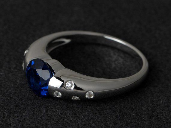 blue sapphire ring silver round cut sapphire gemstone ring sapphire engagement rings promise ring be Formal Sapphire Ring With Bezel Setting In Platinum, Platinum Sapphire Ring With Bezel Setting For Formal Occasion, Platinum Sapphire Ring With Bezel Setting For Formal Events, Modern Round Sapphire Ring With Center Stone, Formal Sapphire Ring With Tension Setting, Modern White Gold Sapphire Ring With Round Shape, Sapphire Jewelry With Tension Setting In Round Band, Oval Sapphire Ring With Bezel Setting, Platinum Blue Ring With Bezel Setting