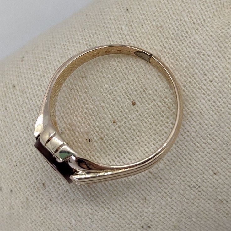 Victorian-era gold jewelry was often made in yellow gold with a soft rose gold hue. This handsome 1800s ring is crafted in 14k rosy gold that has a warm, rich appearance. The focal point is a hard-stone intaglio of a Roman soldier carved from carnelian. This ring is a generous size 12 and would make a unique wedding ring or right-hand statement ring. Please note that this ring is a true antique with over a 100-year history. You will notice in the photos there is white metal on the bottom of the Classic Ruby Ring With Polished Finish For Collectors, Classic Ruby Ring With Polished Finish For Formal Occasions, Classic 14k Rose Gold Ruby Ring For Anniversary, Antique Yellow Gold Ruby Ring With Polished Finish, Vintage 14k Gold Ruby Ring With Polished Finish, Classic 14k Rose Gold Ruby Ring Gift, Classic Gold Ruby Ring For Formal Occasions, Classic 14k Rose Gold Formal Rings, Classic 14k Gold Ruby Ring With Polished Finish