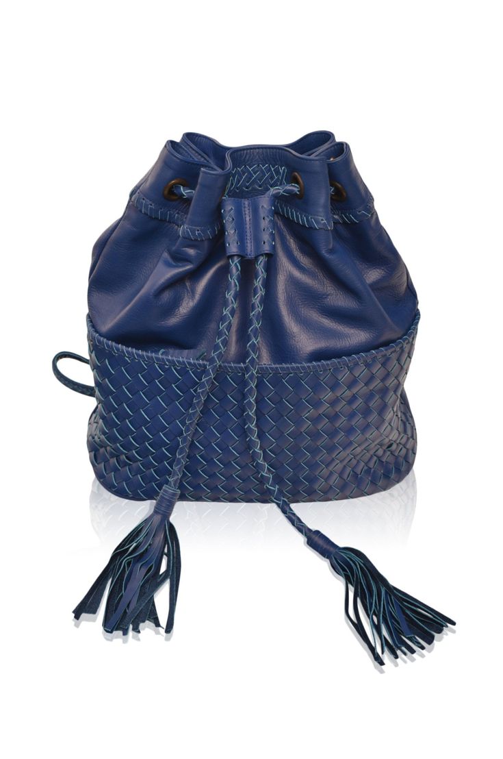 "This backpack is made to order from high quality leather. Ocean Alley convertible is the new staple you'll want to add to your wardrobe and just make everyone swoon when you step out with it. We created ornate woven details on the exterior and added leather stitch accents along the edges and on the straps to give this backpack a rich sophisticated look. Wear it as a backpack, crossbody or as a shoulder bag. Sunup to sundown styling just has never been simpler with our unique and stylish Ocean A Luxury Handwoven Bucket Bag For Travel, Leather Bucket Bag With Intrecciato Weave Crossbody, Luxury Woven Bucket Bag For Travel, Versatile Woven Leather Bucket Bag For Travel, Luxury Woven Leather Hobo Bag For Travel, Woven Leather Bucket Hobo Bag For Travel, Handwoven Leather Bucket Bag For Daily Use, Travel Bucket Bag In Woven Leather Satchel Style, Versatile Leather Bucket Bag With Braided Handles