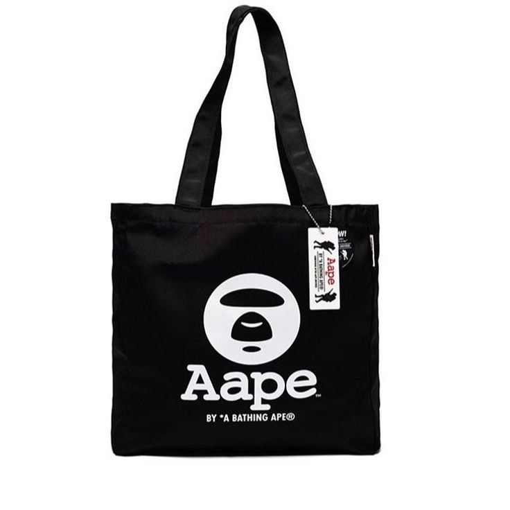 Hypefest Exclusive Tote Black Bags With Logo Patch For Daily Use, Black Everyday Bags With Logo Patch, Everyday Black Bags With Logo Patch, Functional Black Bag With Logo Print, Casual Black Bags With Logo Patch, Black Bag With Logo Tag For Travel, Sporty Logo Bags For Streetwear, White Letter Print Bags For Streetwear, Black Streetwear Bag With Logo Patch