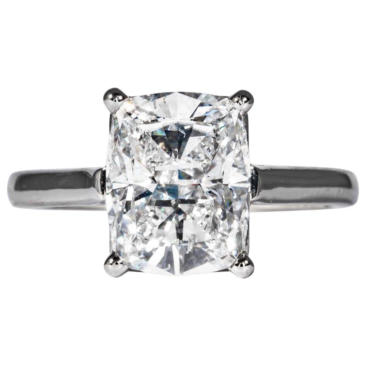 This diamond ring is offered by Shreve, Crump & Low. This 3.05 carat GIA Certified D SI1 cushion cut diamond measuring 10.07 x 7.92 x 5.20 mm is custom set in a handcrafted platinum solitaire ring, signed Tiffany & Co. The 3.05 carat cushion cut is accompanied with GIA report no. 7296550654. Setting is a ring size 6.5, stamped with our maker hallmark's "Tiffany & Co." Shreve, Crump & Low is one of America's oldest and most prestigious jewelry and fine gift establishments founded in 1796. Shreve, Tiffany Diamond, Cushion Cut Diamond, Diamond Solitaire Ring, Cushion Cut Diamonds, Diamond Settings, Tiffany And Co, Diamond Solitaire Rings, Jewelry Rings Engagement, Cushion Cut