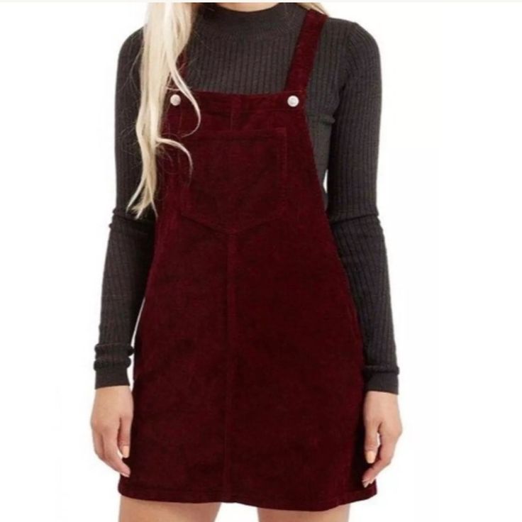 Topshop Tall Moto Burgundy Corduroy Mini Pinafore Dress Overalls Size 4. New With Tags. Super Cute. Product Details Opt For An Alternative To Denim With This Moto Cord Pinafore Dress. In A Clean, Textured Finish, There's A Distinctive '70s Edge To This Throw-On Style. Comes With Practical Patch Pockets And Button Shoulder Fastenings. 100% Cotton. Machine Wash. Model's Height Is 5' 11" * Colour: Burgundy Winter Corduroy Dress With Pockets, Casual Long Sleeve Pinafore Dress, Casual Corduroy Winter Dress, Knee-length Corduroy Dress With Pockets, Casual Corduroy Pinafore Dress For Fall, Casual Corduroy Dress With Pockets, Casual Knee-length Corduroy Dress, Red Velvet Dress For Winter, Red Velvet Winter Dress