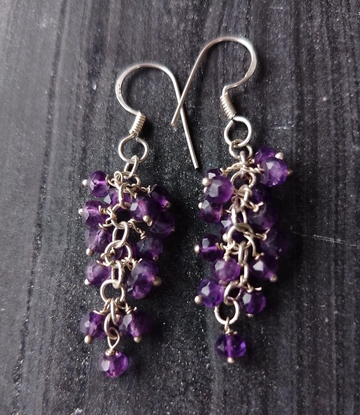 Amethyst faceted rondelle gemstone beaded cluster silver earring, earring gift for her, amethyst beads cluster earrings, amethyst beads silver cluster drop earrings, amethyst dangle earrings, boho earring, every day earrings, gift for daughter, gemstone beaded sterling silver earrings hand made with love and passion. Item: amethyst sterling silver cluster drop earring pair Gemstone: African amethyst  Beads shape: faceted rondelle  Beads size: 4 mm- 4.5 mm approx  Metal: sterling silver Metal pur Gemstone Bead Drop Earrings For Gifts, Bohemian Crystal Earrings With Faceted Beads For Gift, Adjustable Gemstone Bead Drop Earrings, Handmade Purple Chandelier Earrings As Gift, Faceted Bead Jewelry Gift, Handmade Purple Crystal Drop Earrings, Handmade Amethyst Purple Earrings, Handmade Purple Sterling Silver Chandelier Earrings, Gemstone Cluster Earrings Gift