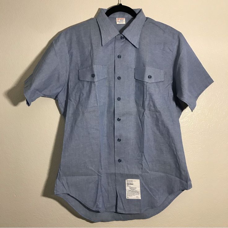 Size: L Open To Offers Measurements Shoulder: 18 1/4in Pit To Pit: 23 3/4in Sleeve: 9 1/2in Length: 31 1/2in In Excellent Conditions No Defects Such As Stains, Tears, Holes, Rips. If You Have Any Questions Regarding This Item Or Any Of The Other Items Listed Please Let Me Know. Thank You Light Blue Collared Cotton Short Sleeve Shirt, Light Blue Cotton Collared Short Sleeve Shirt, Collared Cotton Camp Shirt With Snap Buttons, Classic Blue Short Sleeve Shirt With Pockets, Cotton Camp Shirt With Snap Buttons, Classic Blue Shirt With Camp Collar, Cotton Collared Camp Shirt With Snap Buttons, Fitted Cotton Camp Shirt With Button Closure, Blue Cotton Short Sleeve Shirt For Work