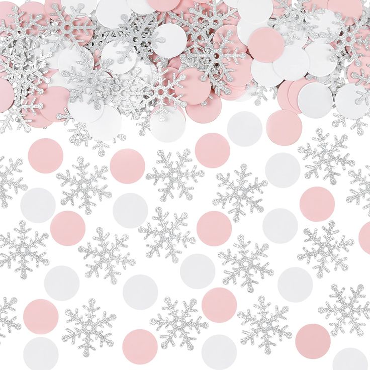 pink and silver confetti paper with snowflakes on the bottom, surrounded by white polka dots