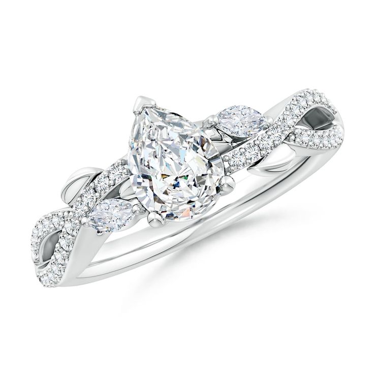 a white gold ring with an oval cut diamond surrounded by small round diamonds on the band