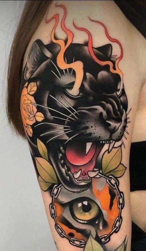 a woman's arm with a tattoo on it and an image of a tiger