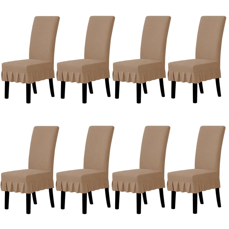 six beige dining chairs with black legs and ruffles on the back, set of 6