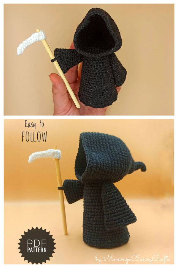 the crocheted figure is holding a toothbrush in it's mouth and wearing a black coat