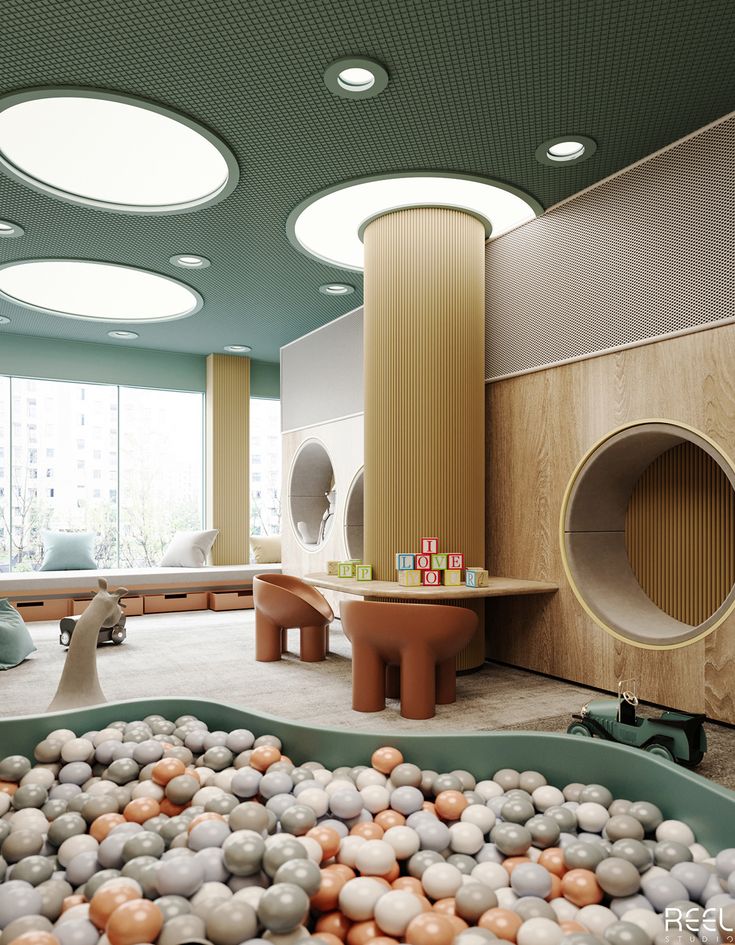 a room with lots of balls in the floor and round lights on the ceiling above it