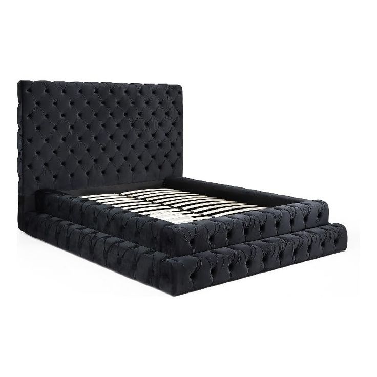 the bed frame is made with black fabric and has buttons on each side, along with an upholstered headboard