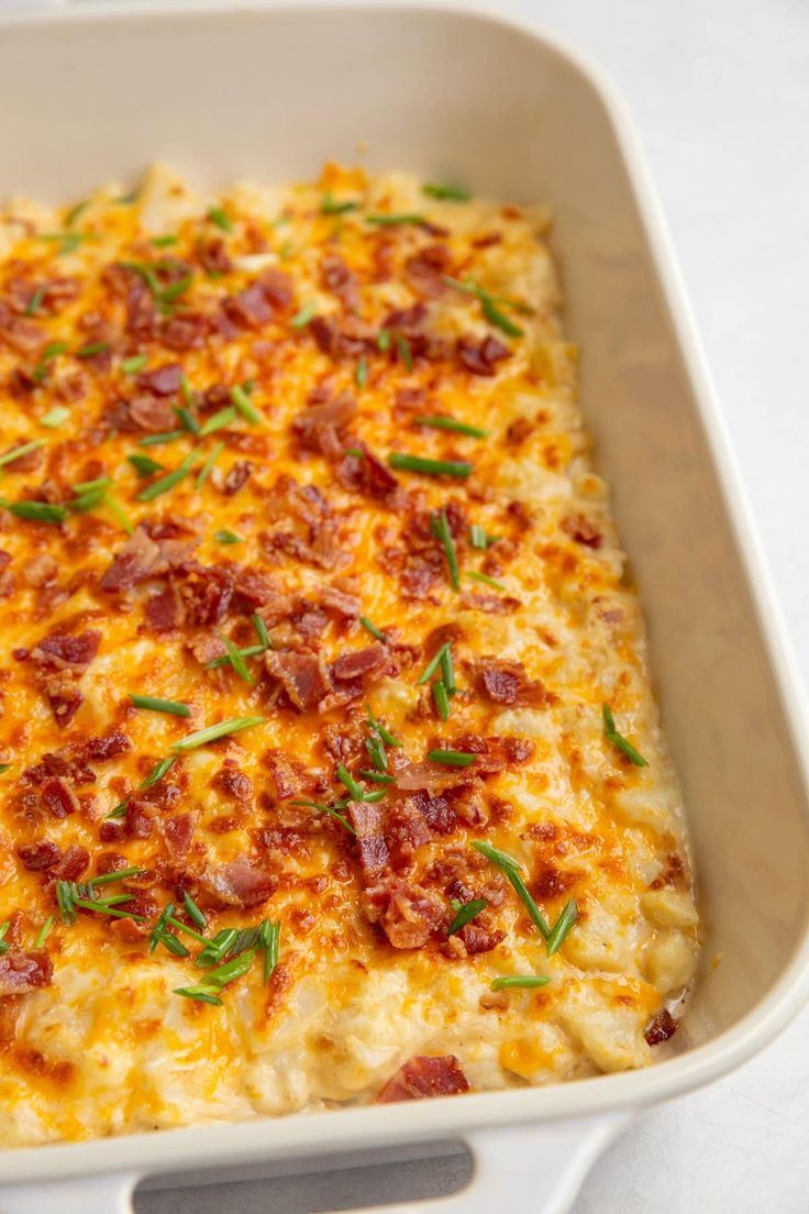 a casserole dish with cheese and bacon