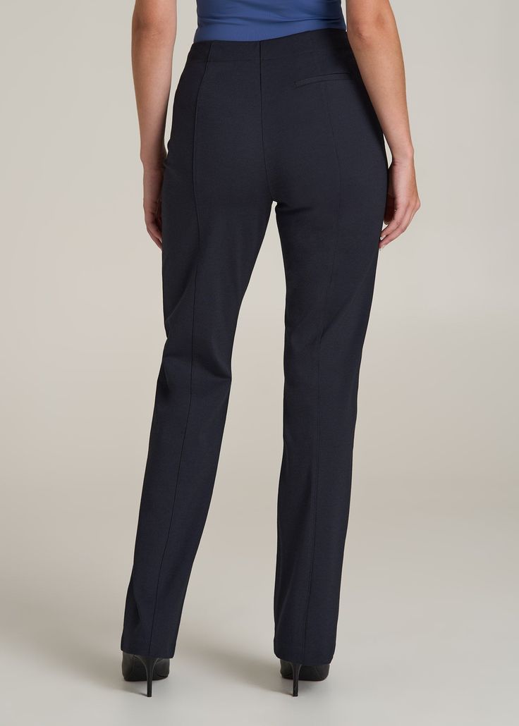 Stand Above the Rest in Style Sleek Pants for Tall Women Introducing your new power player: our tailored Dress Pants. These aren't just tall women's pants; they're a statement. With a flat front design and meticulous tailoring, they epitomize polish and poise. Whether you're commanding the boardroom or charming at a dinner, these women's tall pants ensure you stand out in comfort and style.• Slash and single welt pockets for utility and flair• Flat front for a smooth, modern silhouette• Full len Business Casual Straight Dress Pants With Pull-on Style, Fitted Straight Pants With Pull-on Style, Pull-on 4-way Stretch Dress Pants For Work, Elastane Pull-on Pants, Pull-on Elastane Pants, Full Length Dress Pants With Elastic Waistband, Office Dress Pants With Elastic Waistband And Straight Leg, Straight Leg Bottoms With Elastic Side Panels, Straight Leg Dress Pants With Elastic Waistband For Office