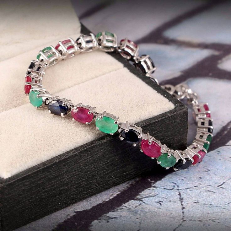 Beautifull Multistone Bracelet, 925 Sterling Silver Bracelet, Emerald And Ruby And Sapphire Bracelet, Silver Bracelet, Gemstone Bracelet, Gift For Her  Bracelet Details... Stone Name :- Emerald, Ruby, Sapphire  Meterial :- 925 Sterling Silver Stone Size :- 6X4 MM Stone Colour :- Emerald = Green, Ruby = Red, Sapphire= Blue  Stone Shape :- Oval Cut Type :- Faceted Stone Tritmant :- Heated Stone Grade :- AAA PRODUCT DESCRIPTION * A perfect gift choice for friends, mother, wife,bride and business partner. Also a great Gemstone gift for birthdays, weddings, anniversary, graduation day etc.   * Stunning looking and comfortable to wear, so easy to put it on and take it off. Customisation is always welcome and please feel free to contact with me if you have any design ideas! PAYMENT POLICY We Acce Sterling Silver Fine Jewelry Bracelets With Stones, White Gold Bracelet With Gemstone Accents For Gift, Sterling Silver Multi-stone Bracelets, Sterling Silver Multi-stone Round Bracelet, Oval Sterling Silver Bracelets With Multi-stone, Sterling Silver Multicolor Stone Bracelets, Formal Sterling Silver Bracelets With Natural Stones, Multicolor Sterling Silver Bracelets With Stones, Elegant Multicolor Sterling Silver Beaded Bracelets