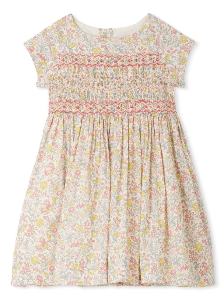 white/multicolour cotton all-over floral print smocking details round neck short sleeves rear button fastening straight hem Cotton Short Sleeve Smocked Dress For Daywear, Cotton Smocked Short Sleeve Dress For Daywear, Floral Dress With Smocked Bodice For Garden Party, Casual Multicolor Floral Dress With Smocked Back, Fitted Cotton Smocked Dress With Ditsy Floral Print, Multicolor Smocked Bodice Dress For Garden Party, White Short Sleeve Dress With Smocked Back, Multicolor Short Sleeve Smocked Dress For Spring, Multicolor Smocked Short Sleeve Dress For Spring