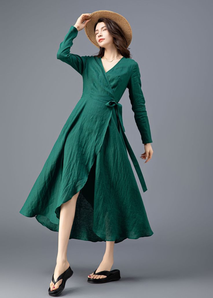 "★★ FEATURES * Pure linen fabric * Two side seam pockets * Wrap dress with belt on waist * V neckline * Midi length * Perfect for Spring, Summer, Autumn * Wash by hand or machine with cold water ★★ The model is 165 cm (5′ 5″) tall with a 80 cm (31.5\") bust, 66 cm (26\") waist. She is wearing the brown linen skirt in size XS. ★★ Bespoke Order Service If you Request other color Request the length Your height is not between 155 cm- 172 cm Your weight is over 75 kg I can do it for you, It will need some extra fee depending on on your need. Contact with me for more detail. ★★ Get your size in Size Chart with your body measurement https://www.etsy.com/listing/794055682 ★★ Warmly Note: 1 ) : Please confirm your shipping address! If you wish to ship the item to a different address, please send me Green V-neck Dress For Fall, Elegant Non-stretch V-neck Dress For Spring, Green A-line Long Sleeve Dress For Spring, Green Non-stretch Midi Dress, Elegant Green Knee-length Long Sleeve Dress, Elegant Green Non-stretch Maxi Dress, Spring Long Sleeve Green V-neck Dress, Green Long Sleeve V-neck Dress For Fall, Spring Green Midi Wrap Dress