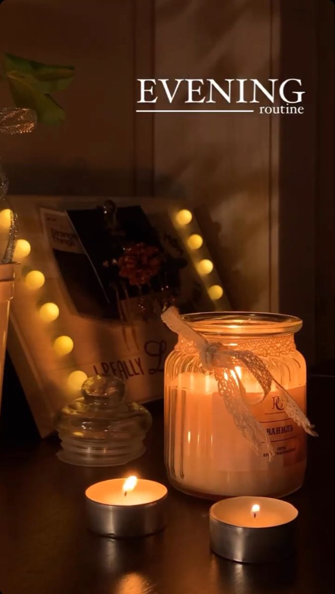 two candles sitting next to each other on a table