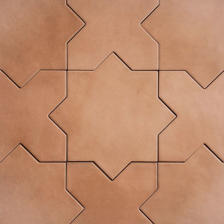 an image of a tile pattern that looks like hexagonal shapes on the wall