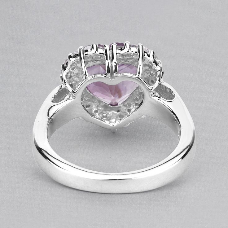 "Amethyst Ring, Halo Amethyst Heart Silver Ring, Natural Amethyst Ring for Women, February Birthstone Ring Flaunt yourself with this amethyst & white topaz halo ring. The natural gemstones have a combined weight of 3.53 carats and are set in .925 sterling silver with rhodium plating. The purple hue of this ring adds a pop of color to any look! The understated design and vibrant stones make this ring perfect for every occasion. amethyst halo silver ring, amethyst ring, amethyst silver ring, n Heart Cut Amethyst Jewelry With Center Stone, Heart Cut Amethyst Ring With Accent Stones, Valentine's Day Purple Amethyst Promise Ring, Amethyst Heart Cut Ring For Anniversary, Fine Jewelry Amethyst Ring Heart Cut, Purple Amethyst Birthstone Ring For Valentine's Day, Fine Jewelry Heart Cut Amethyst Ring, Purple Amethyst Heart Cut Ring For Valentine's Day, Purple Heart Amethyst Ring With Accent Stones