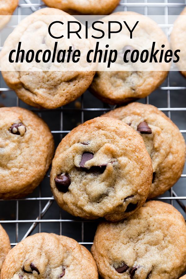 chocolate chip cookies on a cooling rack with text overlay reading crispy chocolate chip cookies