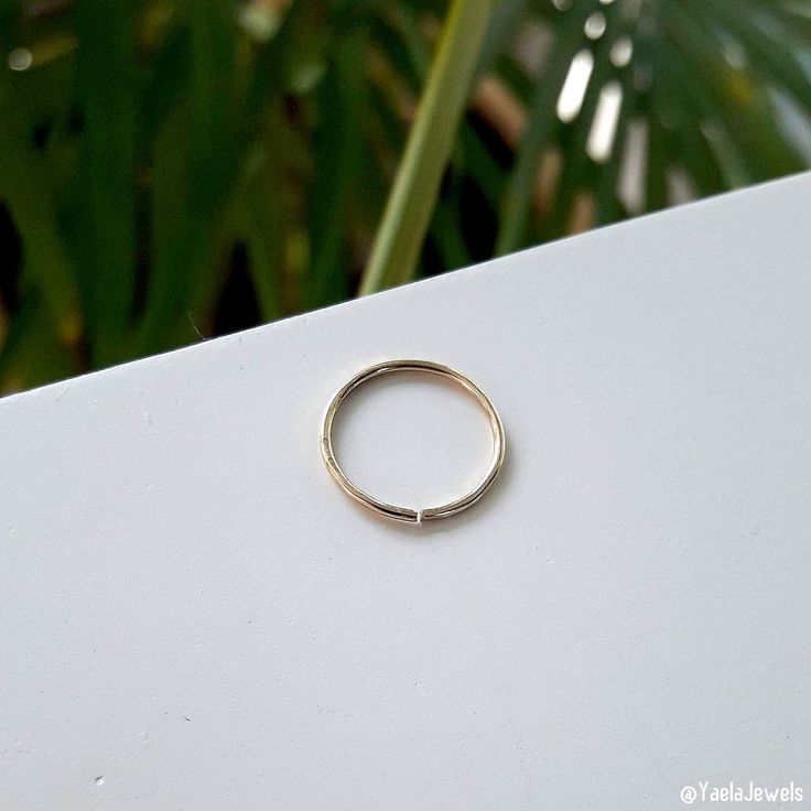 Simple and delicate belly button hoop ring. It comes in 14k goldfilled or 925 sterling silver and its nickel-free. A small opening in the hoop that you twist open to put on and close once in. ★Available Gauge: 20(0.8mm), 18 (1mm) in 8mm, 10mm or 12mm diameter. ★Note: Please Choose Accurate size for your piercing The perfect gift for you or your loved ones. 🔸🔸BELLY BUTTON ARE FINAL SALE DUE TO HYGIENIC REASONS🔸🔸 In the picture: 20g - 12mm ★Packaging All items are packed in an elegant jewelry Tiny 14k Gold Round Midi Rings, Gold Sterling Silver Stackable Toe Rings, Silver 14k Gold Filled Rings, Yellow Gold Toe Ring, Adjustable Small Hoop Septum Ring For Everyday, Adjustable Minimalist Huggie Septum Ring, Nickel-free Minimalist Huggie Septum Ring, Everyday Stackable Huggie Rings, Hypoallergenic 14k Gold Round Midi Rings