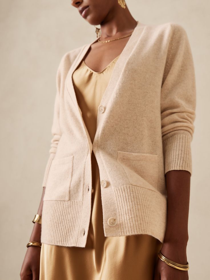 Luxurious and lightweight, this plush cardigan sweater is a mastery of modern design crafted in our all-season cashmere, a soft and sumptuous staple for everyday, especially transitioning seasons.  RELAXED FIT: Expertly cut for a loose fit.  Dropped Soft Knit V-neck Cardigan For Daywear, Chic Soft Texture Cardigan For Loungewear, Classic Fine Knit Relaxed Fit Cardigan, Classic Fine Knit Cardigan With Relaxed Fit, Classic Relaxed Fit Fine Knit Cardigan, Relaxed Fit Cashmere Cardigan For Layering, Fine Knit Long Sleeve Cardigan With Relaxed Fit, Relaxed Fit Fine Knit Cardigan For Work, Relaxed Fit Fine Knit Work Cardigan