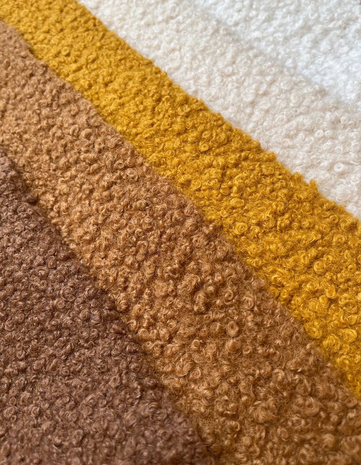 several different colors of carpet laid out on top of each other