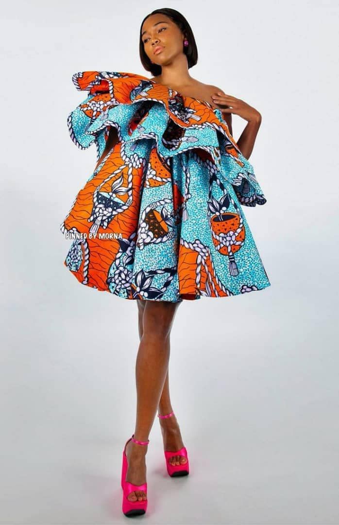 "Beautiful African print dress perfect for weddings, baby showers , bridals , birthday and any occasion you plan to look your best in.  Made Quality 100% percent African print fabric, Ankaras  Care: Wash with mild detergent. Do not bleach This is custom made for you, so you are welcome to request any customization or changes. You may provide your measurements if you have it. Otherwise our sizes are very accurate. Just choose your right size while ordering. Please note that this is tailored to you, the exact fabric might not be available at the time of your order, if so a similar fabric will be used or you can select from the  given lots of fabric options we've provided to choose from. Please send us a fabric of choosing so as not to delay your order .  Size Chart  XS (US 2, UK 6) Bust: 33. Short African Print Dresses, Vlisco Dresses, African Birthday Dress, African Midi Dress, Ankara Prom Dress, Vanessa Rose, Christie Brown, African Couture, African Elegance