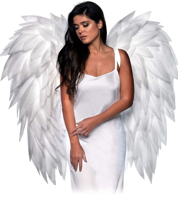 a woman in a white dress with angel wings