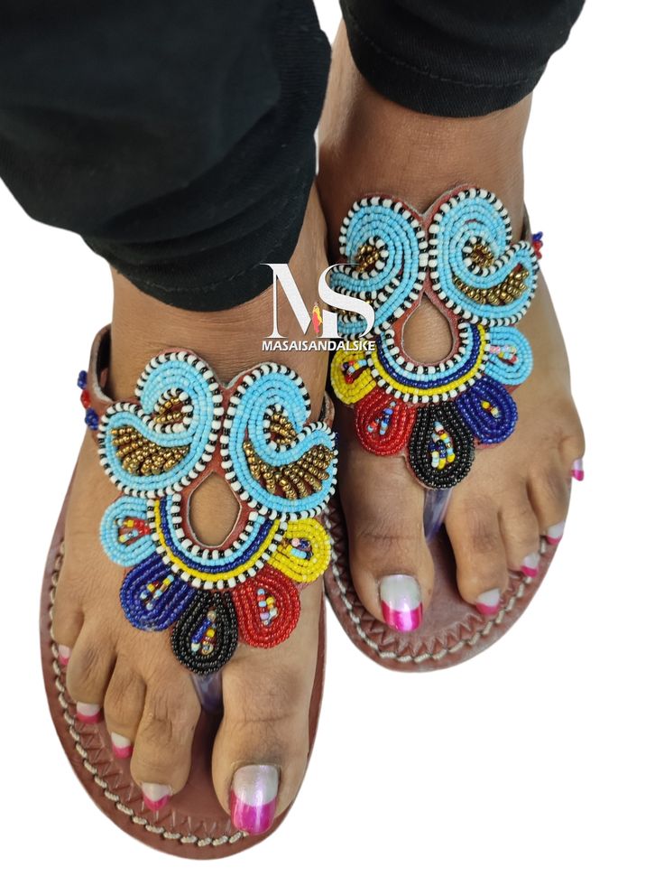 100% handmade using leather and fine beads. Masai beaded sandals are made using the pure original leather and quality African beads.They are inspired by the Masai community They are perfect for any occasion. True to size. We ship worldwide. Feel free to send me a convo for any clarifications Blue Beaded Sandals For Vacation, Blue Beaded Open Toe Sandals, Blue Beaded Adjustable Sandals, Blue Beaded Sandals For Beach, Traditional Blue Leather Sandals, Traditional Blue Open Toe Sandals, Handmade Blue Sandals For Vacation, Traditional Handmade T-strap Sandals For Festival, Traditional Handmade Closed Toe T-strap Sandals