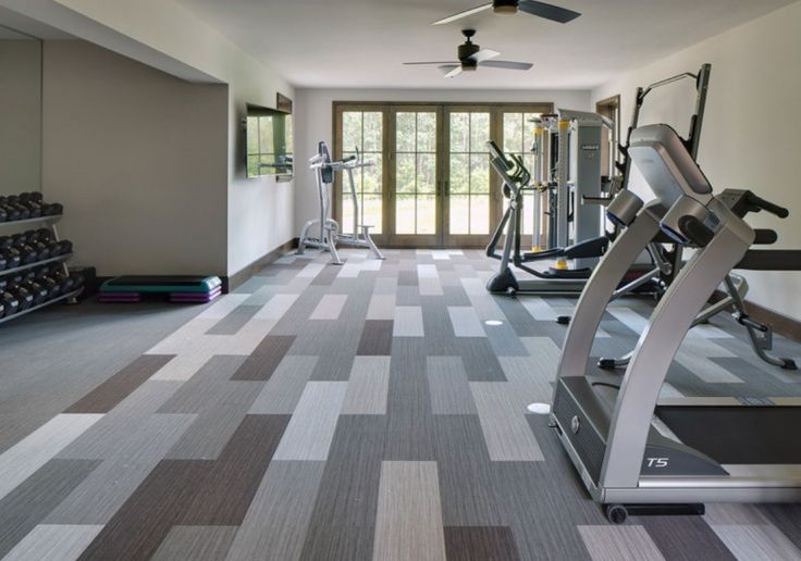 a gym with treadmills and exercise machines