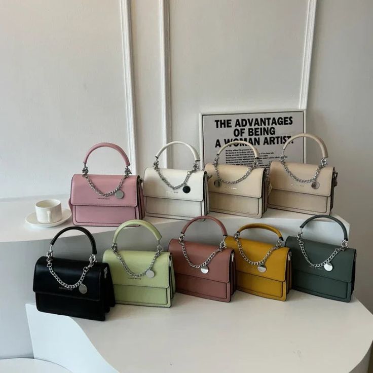 SPECIFICATIONSBrand Name: YIYUEQIANLIHign-concerned Chemical: NoneHandbags Type: Shoulder BagsTypes of bags: Shoulder & Crossbody BagsMain Material: PULining Material: Synthetic LeatherShape: SQUAREPlace Of Origin: HE BEI ProvincePlace Of Origin: HE BEI ?ProvinceOrigin: Mainland ChinaCN: HebeiHardness: HARDPattern Type: SolidOccasion: VersatileClosure Type: haspGender: WOMENStyle: fashionNumber of Handles/Straps: SingleFeatures 1: Synthetic LeatherFeatures 2: HaspFeatures 3: Messenger BagsChoice: yessemi_Choice: yes Trendy Beige Box Bag With Chain Strap, Trendy Shoulder Bag With Chain For Daily Use, Trendy Square Satchel As Fashion Accessory, Trendy Beige Bag With Chain Strap, Trendy Bag With Chain Strap For Daily Use, Trendy Bags With Chain Strap For Daily Use, Trendy Everyday Shoulder Bag With Chain, Trendy Shopping Bag With Chain Strap, Trendy Shopping Bags With Chain Strap