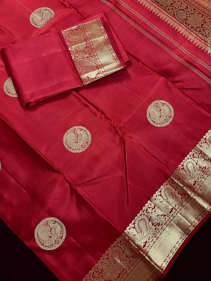 SILK MARK CERTIFIED !!! Gorgeous Maroon Red Color Color Pure Kanjivaram Kanchipuram Handwoven Pure Silk Saree with Gold Zari Weave. Saree has Peacock Motifs on the body and on the Border. Item : SareeBase Fabric : Pure Kanjivaram Silk Color : Maroon Red ColorBlouse piece : Comes with un-stitched Blouse piece.Blouse material : Pure Kanjivaram Silk Work : Heirloom Fall & Edging(Yes/No) : YesSilk Mark Certificate given with the Saree(Yes/No) : Yes Disclaimer :-- Color variation is possible due to v Red Handloom Lehenga For Navratri, Anarkali Traditional Wear For Rituals And Festivals, Traditional Handloom Red Lehenga, Traditional Red Handloom Lehenga, Red Tussar Silk Sets With Cutdana Detail, Red Handloom Lehenga For Puja, Handloom Red Lehenga For Puja, Red Tussar Silk Set For Diwali, Red Handloom Art Silk Traditional Wear