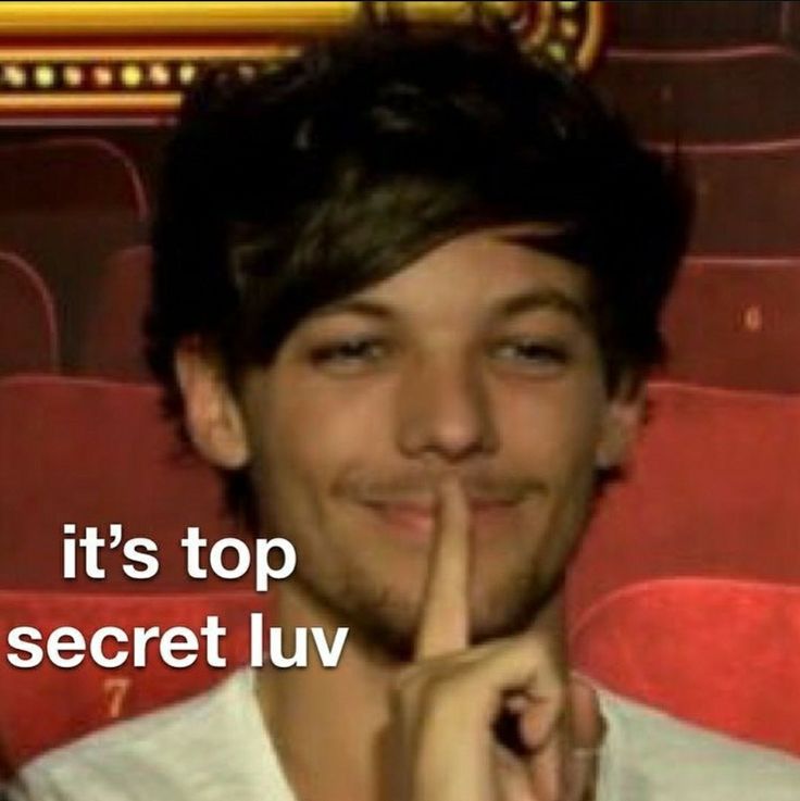 a man making a hush with his finger in front of him and the words, it's top secret luv