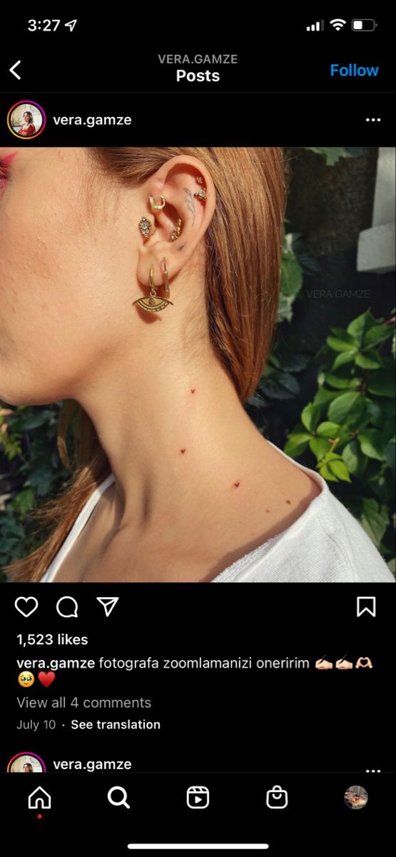 an image of a woman with ear piercings on her left side and right side