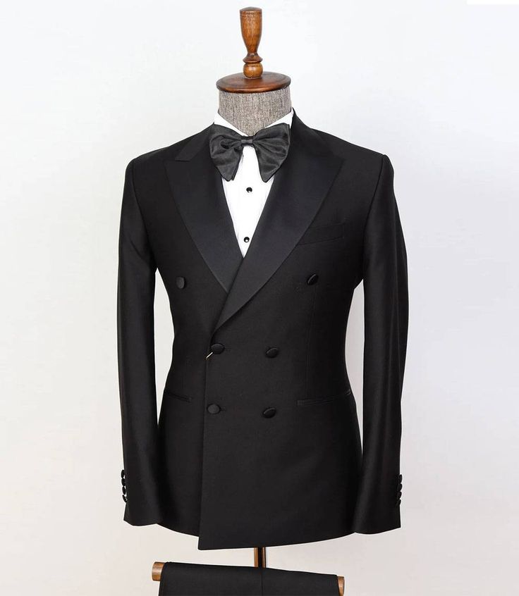 Mens Two Piece Black Tuxedo
Experience timeless sophistication with our Double Breasted Two Piece Men's Black Tuxedo. Meticulously crafted, this tuxedo exudes elegance. The double-breasted jacket features a classic peak lapel and six-button front, channeling vintage charm. Accompanied by impeccably tailored trousers, it ensures a sleek, flattering fit. Perfect for formal events, weddings, or any occasion demanding refinement. Make a statement in this iconic black tuxedo, symbolizing classic soph Black Tailored Tuxedo For Wedding, Black Tailored Wedding Tuxedo, Elegant Black Double Breasted Suit For Black Tie, Classic Slim Fit Tuxedo For Wedding, Black Fitted Double Breasted Suit For Party, Fitted Black Double Breasted Suit For Wedding, Fitted Black Double Breasted Suit For Party, Dapper Fitted Tuxedo For Black-tie Events, Fitted Dapper Tuxedo For Black-tie Events