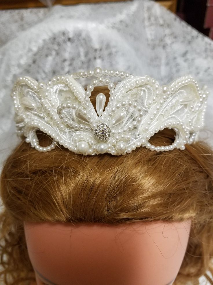 "Beautiful antique white pearls crown, please look at the pictures, it is ideal for First Communion, please look at every picture for the details. PLASTIC COMB ON THE BACK TO ATTACH TO HAIR. The veil is really streams of tulle falling down the shoulders 15\" long crown is 2\" high Please contact for any questions, or concerns. FINAL SALE, NO RETURNS, NO EXCHANGES." Adjustable Princess Crown For Wedding, Adjustable Wedding Crown, Elegant Lace Hair Accessories For Wedding, Elegant Ribbon Headband For Wedding, Adjustable Ribbon Headpiece For Wedding, Wedding Crown With Structured Princess Style, White Pinched Crown For Wedding, Princess Style Wedding Crown With Structured Shape, Princess Style Wedding Crown With Structured Design