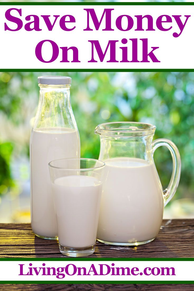 two jugs of milk next to a pitcher and glass on a wooden table with the words save money on milk