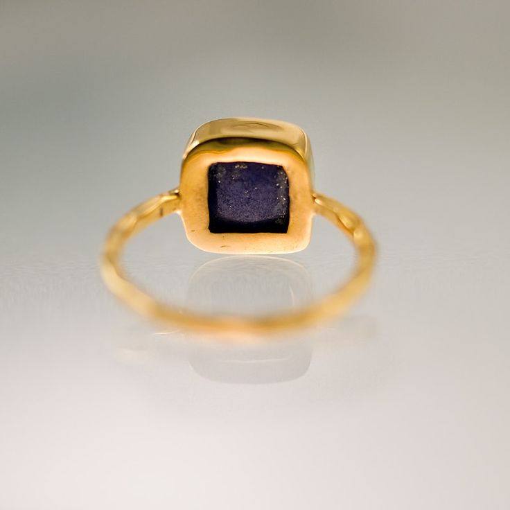 "Navy Blue Lapis Lazuli Cushion Cut Ring. Available in 18K Gold Vermeil or 925 Sterling Silver. Please select size and metal option from drop down menu. This listing is for the following 1 (ONE) ring: ✦Gemstone: Lapis Lazuli ✦Stone Cut: Square, Round, or Teardrop ✦Stone Size: Approximately 9mm (0.35\") ✦Metal: 18K Gold Vermeil or 925 Sterling Silver *Because we use natural stones, the stones may vary slightly in shape, size and color. *Each item is packaged individually in a GIFT BOX Please view Tanzanite Sapphire Ring As Gift, Handmade Sapphire Crystal Ring Gift, Tanzanite Bezel Set Ring, Tanzanite Yellow Gold Birthstone Ring As Gift, Sapphire Crystal Ring Gift, Yellow Gold Tanzanite Birthstone Ring For Gift, Sapphire Ring Jewelry Gift, Sapphire Gemstone Rings For Gift, Sapphire Gemstone Ring As Gift